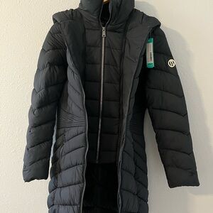 Navy, packable coat with removable bib. New with tags.